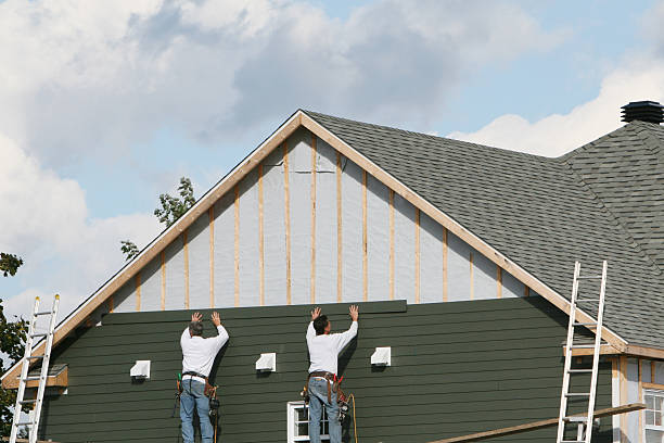 Professional Siding Contractor technician working in Bristow, VA